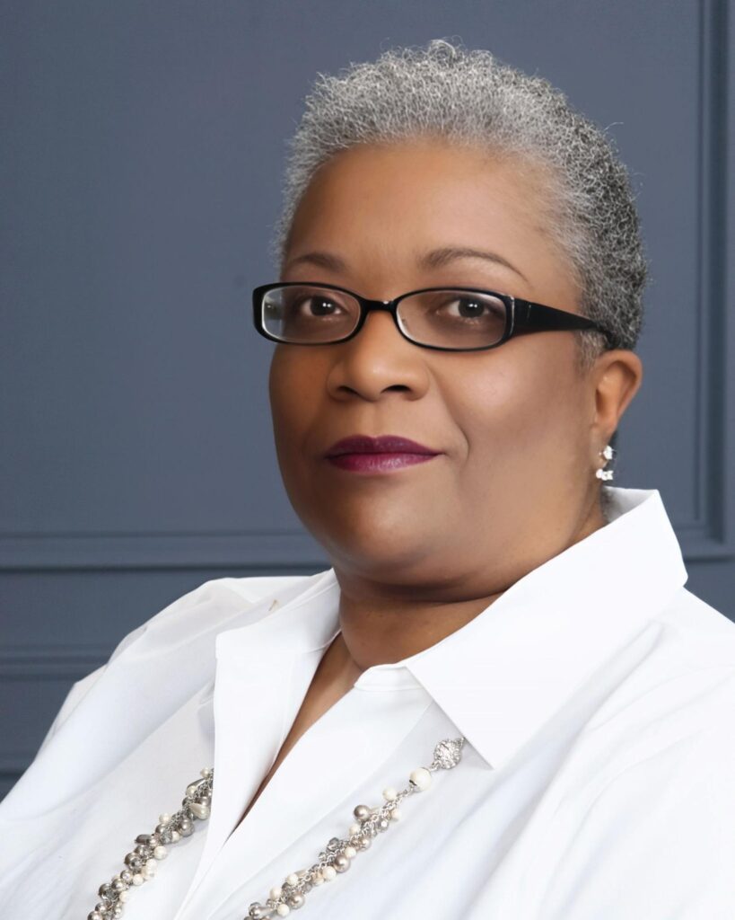 Headshot of author Valerie (V.M.) Burns